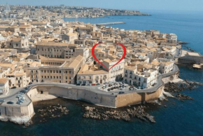 Отель Casa Nagalè- Una suite di charme nel cuore di Ortigia a 50 mt dal mare, Сиракуза